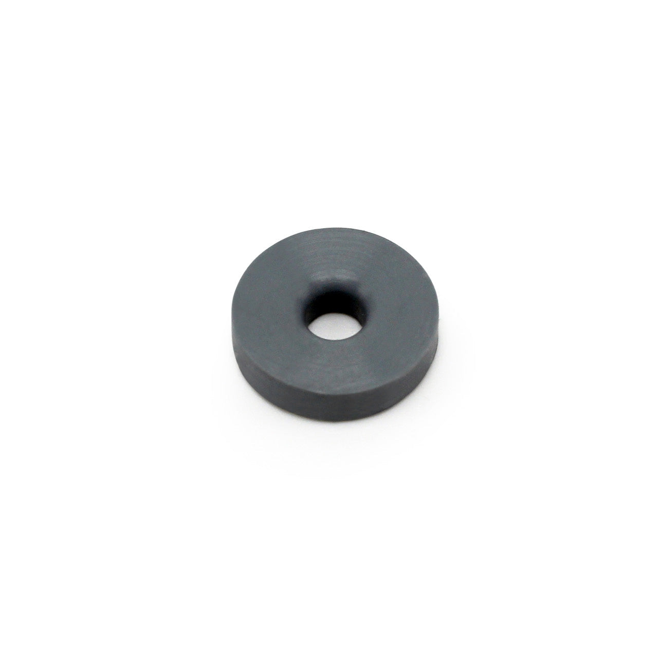 The Prestacycle Prestaflator Mini Presta Head Gasket is a small, flat, round black disc with a center hole, shown on a white background. This component ensures Presta valve compatibility for the Prestaflator MINI.