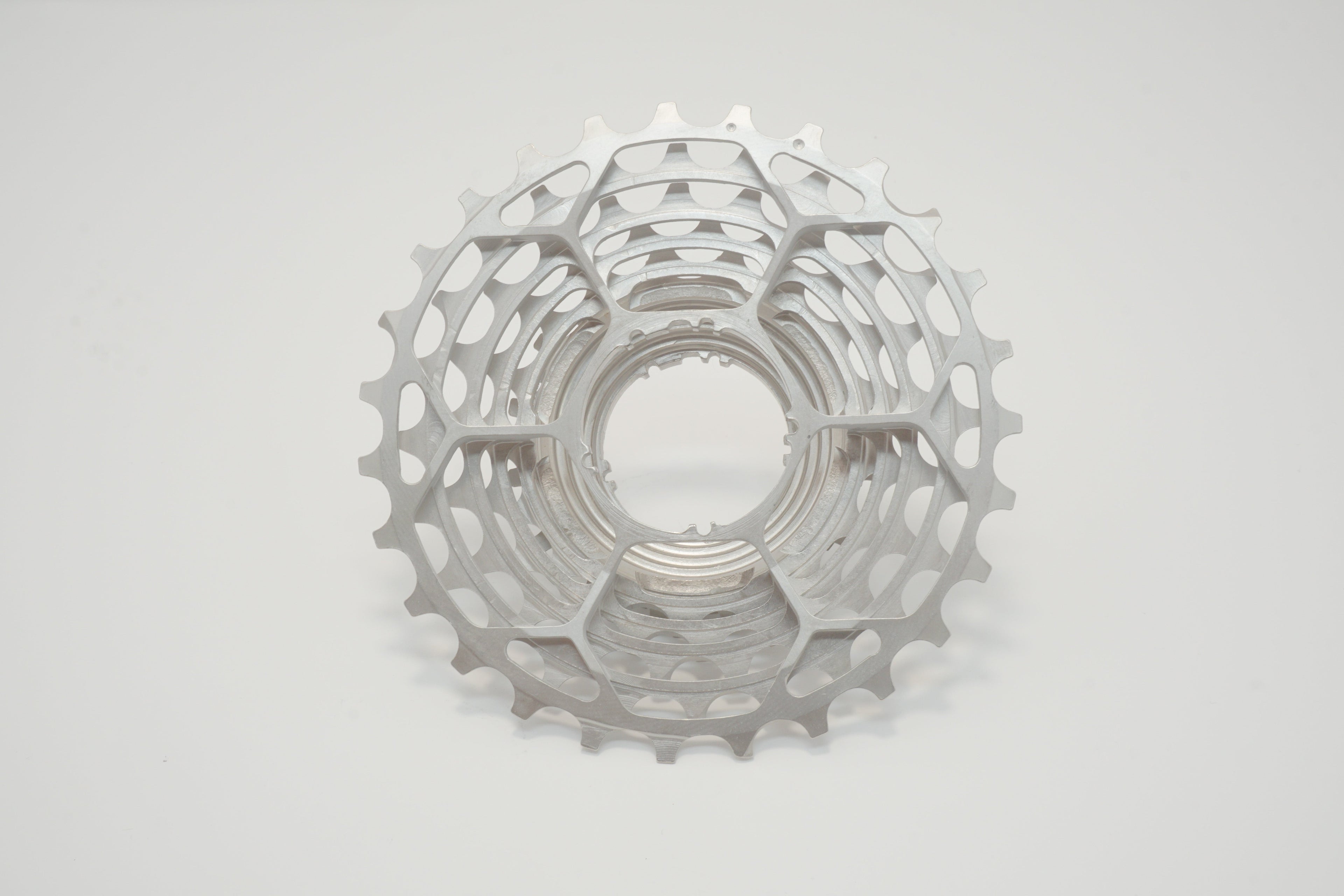 Close-up, front-facing view of a Prestacycle UniBlock PRO Cassette (11 Speed) for Shimano, featuring multiple sprockets made from durable Chrome Molybdenum steel, shown on a plain white background.