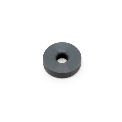 The Prestacycle Prestaflator Mini Presta Head Gasket is a small, flat, round black disc with a center hole, shown on a white background. This component ensures Presta valve compatibility for the Prestaflator MINI.