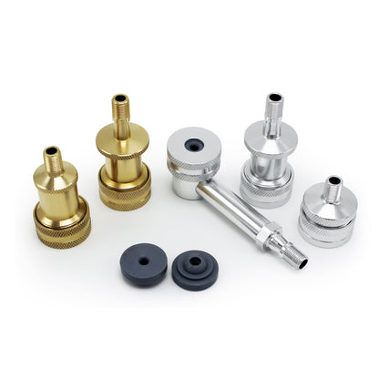 Five metallic adapters—three gold and two silver—are paired with two Prestacycle Prestaflator Big Presta Head Gaskets and a silver connector tube, ideal for use with Prestaflator BIG or Silca pump heads.