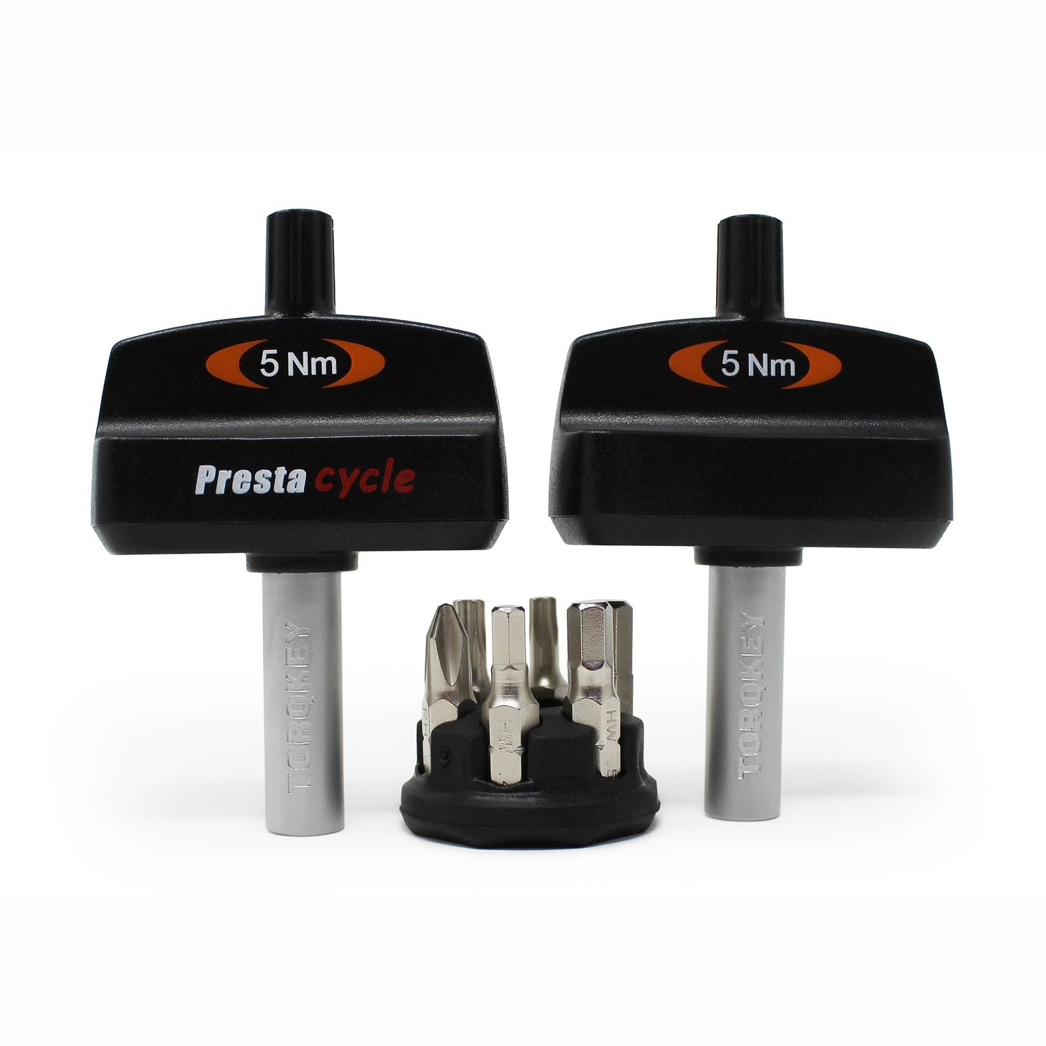 Three black Prestacycle Mini TorqKeys preset torque tools (3Nm, 4Nm, and 5Nm) stand upright with a round holder containing six interchangeable bits in front of them.