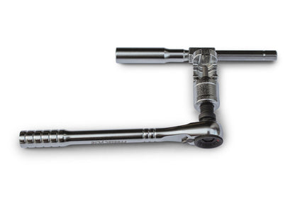 The Prestacycle PrestaRatchet Chain Accessory, featuring a metal ratchet wrench with socket and T-bar handle in an L-shape, is ideal as a portable chain tool for cyclists.
