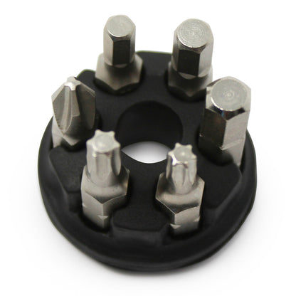 The Prestacycle Professional 6 piece 1/4 S2 Hex Bits Set features six uniquely tipped S2 steel bits in a black circular holder, organized upright for easy, precise selection—perfect for bicycle tool storage and quick access.