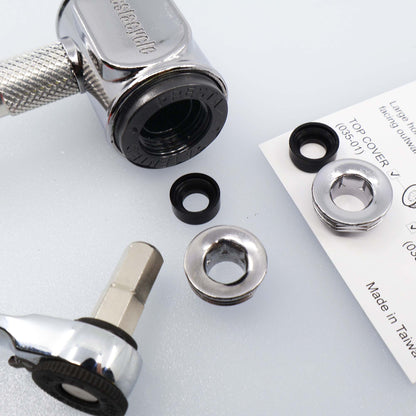 A close-up of a Prestacycle Prestaflator Pro Presta Head Rebuild Kit shows the ratchet tool, metal washers, black rubber rings, and paper manual on a light surface, highlighting the components for assembly or repair.