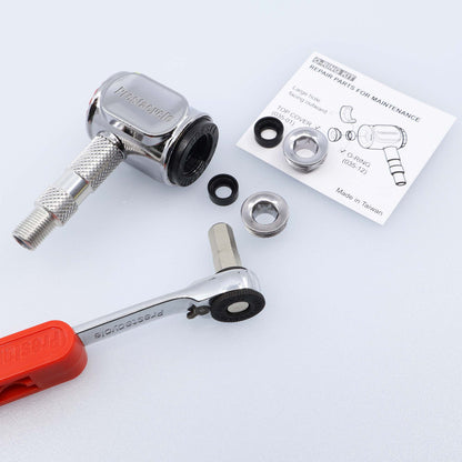 The Prestacycle Prestaflator Pro Presta Head Rebuild Kit, including a metal faucet cartridge, rubber washers, metal rings, a red-handled wrench, and an instruction sheet, is arranged on a white surface.