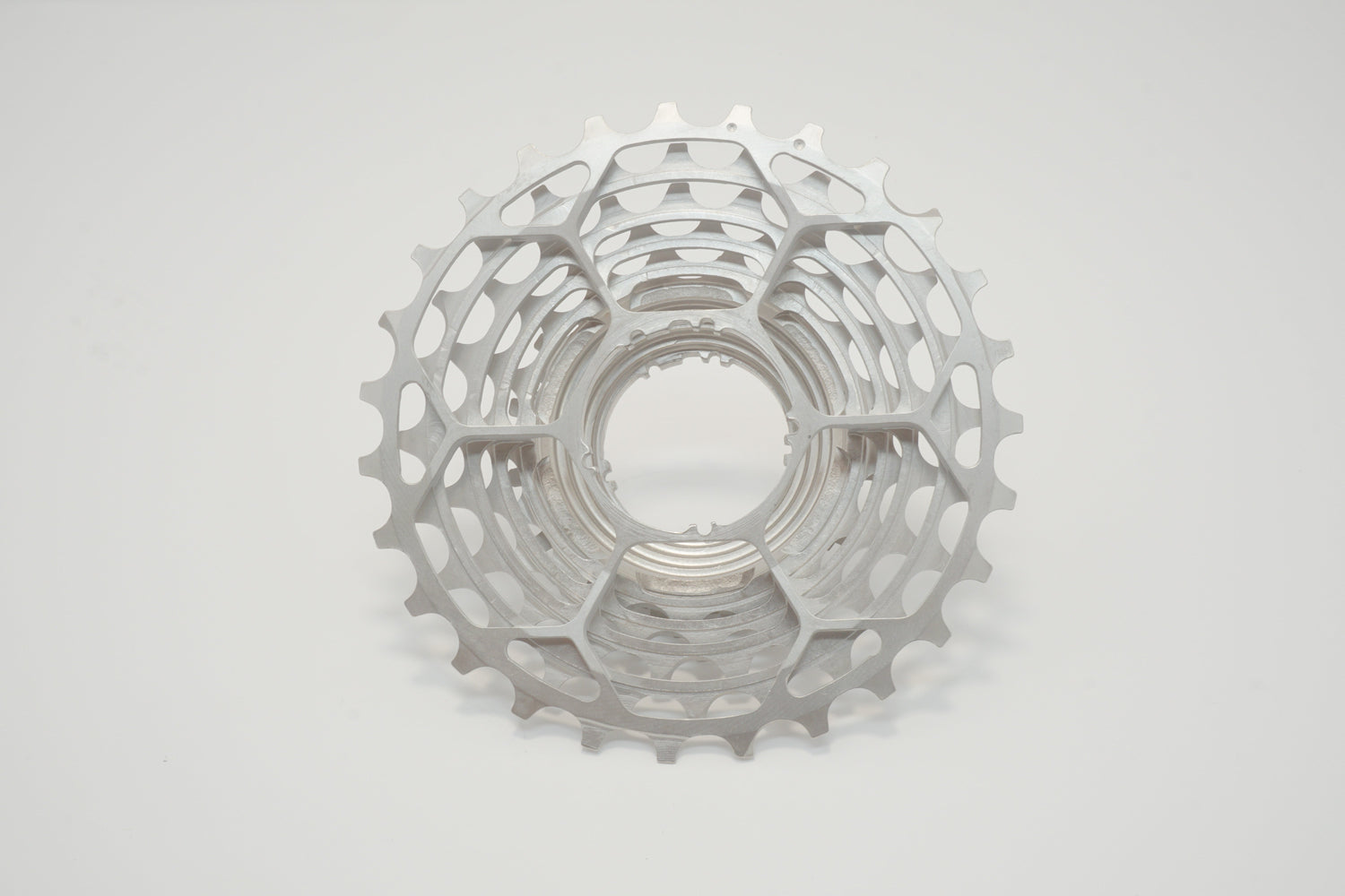 Close-up, front-facing view of a Prestacycle UniBlock PRO Cassette (11 Speed) for Shimano, featuring multiple sprockets made from durable Chrome Molybdenum steel, shown on a plain white background.