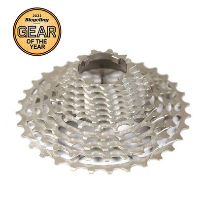 The Prestacycle UniBlock PRO Cassette (12 Speed) for Campagnolo is shown on a white background, with a gold 2023 Bicycling Gear of the Year badge in the top left corner.